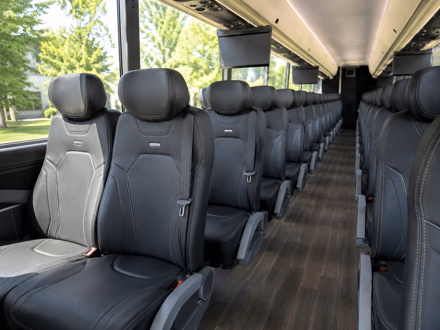 bus type changes what a charter bus costs in lansing michigan