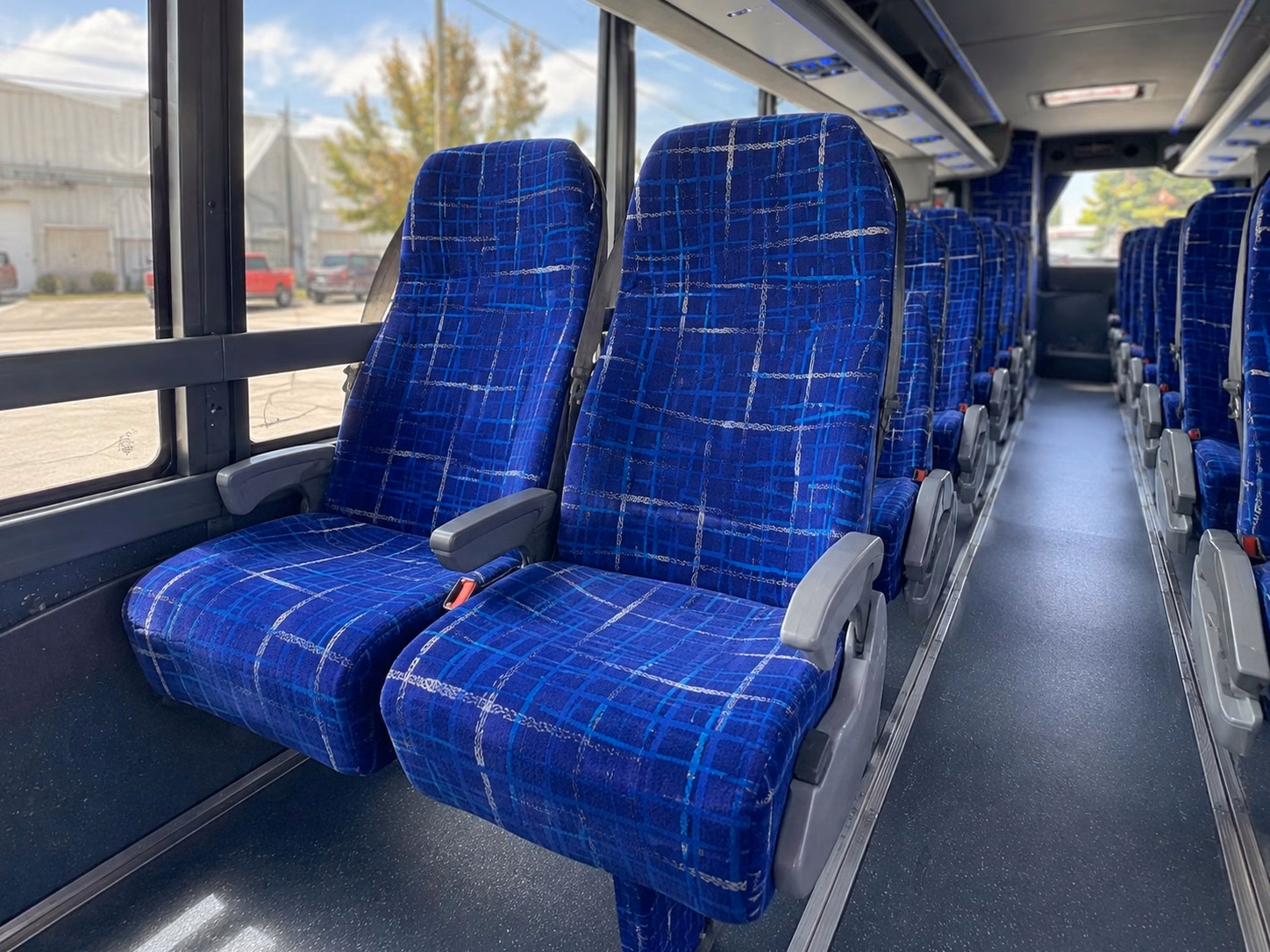 fan group and tailgate bus rentals for lansing sporting events