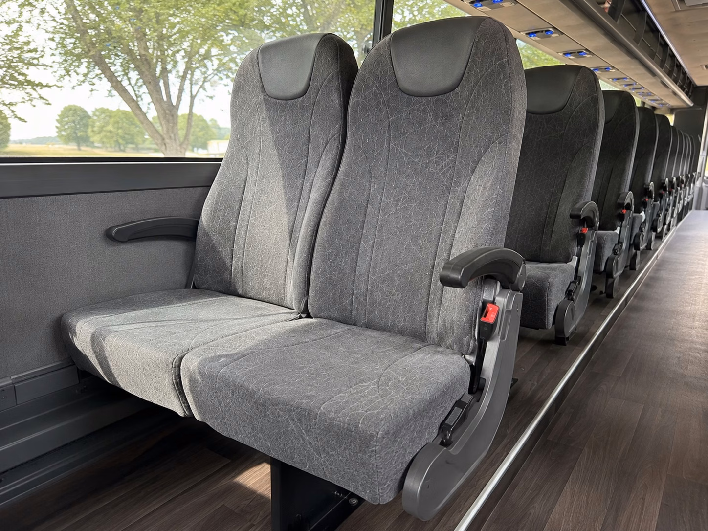 how time of year and peak season affect lansing charter bus prices