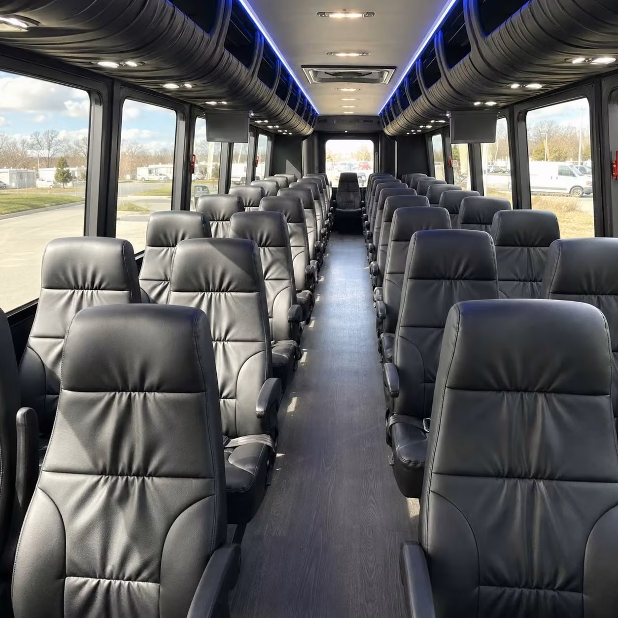 lansing 28 passenger minibus rental